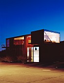 Cubist building with illuminated interior