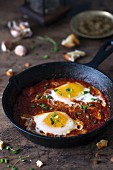 Shakshuka (poached eggs in tomato and pepper sauce, Middle East)
