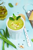 Green bean soup with mint and almonds