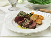 Venison steak with salsa verde butter and fried potatoes