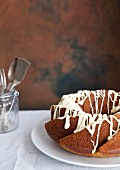 A ring-shaped Bundt cake with white chocolate