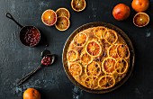 Upside-down cake with blood oranges and pomegranate syrup (seen from above)
