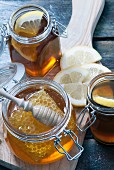 Organic honey with honey comb in mason jar