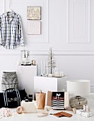 Masculine Christmas gift ideas in front of white wall