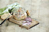 Beer garden salad with radishes in a glass jar