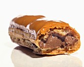 An eclair filled with chocolate