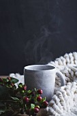 A hot drink in a stoneware mug