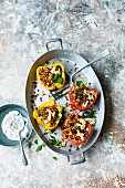 Stuffed peppers with lupin groats and soya and almond sauce