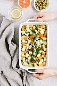 A large plate of cooked winter root vegetables in a rectangular plate