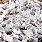 Lithuanian Christmas treats fried dough with powdwered sugar