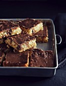 Semolina and coconut tray cake with coconut and liquorice confectionery