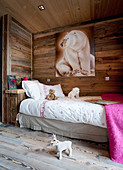 Picture of polar bear in child's bedroom with wooden walls