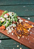 Pumpkin fritters and a colourful salad