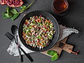 Colorful quinoa salad with spring onions