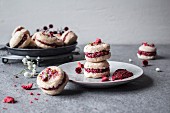 Raw coconut macarons with strawberry filling