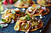 Tostadas topped with jalapenos