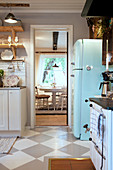 View from country-house kitchen into dining room