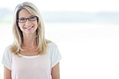 Mature woman wearing glasses