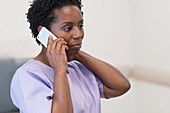 Woman nurse on cell phone