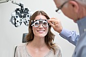 Woman having eye test