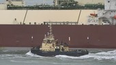 Tugboat and LNG tanker