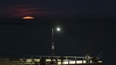 Moonrise over an Atlantic shoreline, time-lapse footage