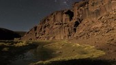 Night-to-morning time-lapse over canyon, Chile
