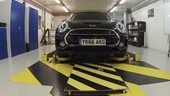 Mini car having its suspension tested