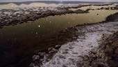 Stars reflected in Atacama salt flat, time-lapse footage