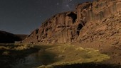 Night-to-morning time-lapse over canyon, Chile
