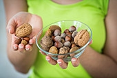 Woman eating dry fruits