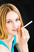 Woman smoking electronic cigarette