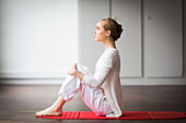 Woman practicing stretching exercises