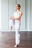 Woman practicing stretching exercises