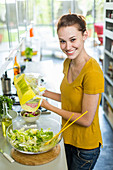 woman preparing a salad