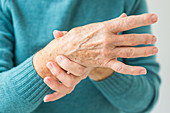 Senior woman suffering from articular pain