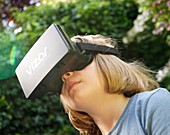 Child wearing a virtual reality headset