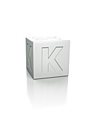 Cube with the letter K embossed.