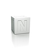 Cube with the letter N embossed.