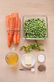 Ingredients for the preparation of peas and carrots