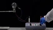 High-voltage electricity damaging a light bulb