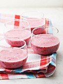 Blackcurrant smoothies with parsley and coconut milk