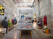 Long table and mannequins in designer's studio