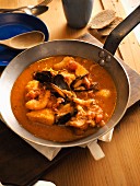 Caciucco alla livornese in pan, tuscan traditional fish soup, Tuscany, Italy