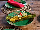 Fish in banana leaf with ligth curry, Lombok island, Indonesia