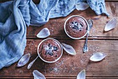 Chocolate coconut millet pudding served in little bowls