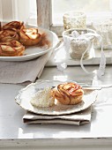 Puff pastry apple roses with whipped cream
