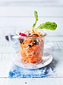 Carrot and cranberry salad in a glass