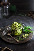 Cucumber relish with capers and dill in a glass jar
