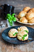 Fried pastry biscuits with basil and white chocolate cream
